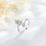 Silver ring with a dog and zirconia stones.