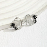 Huggie earrings heart and black enamel.